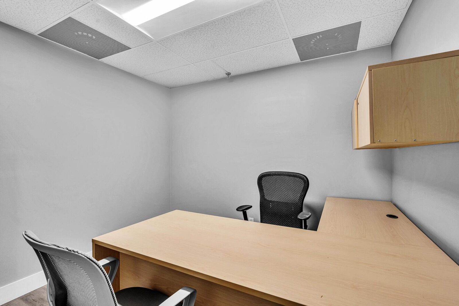 Private office suite with natural lighting at Pompano Executive Rentals